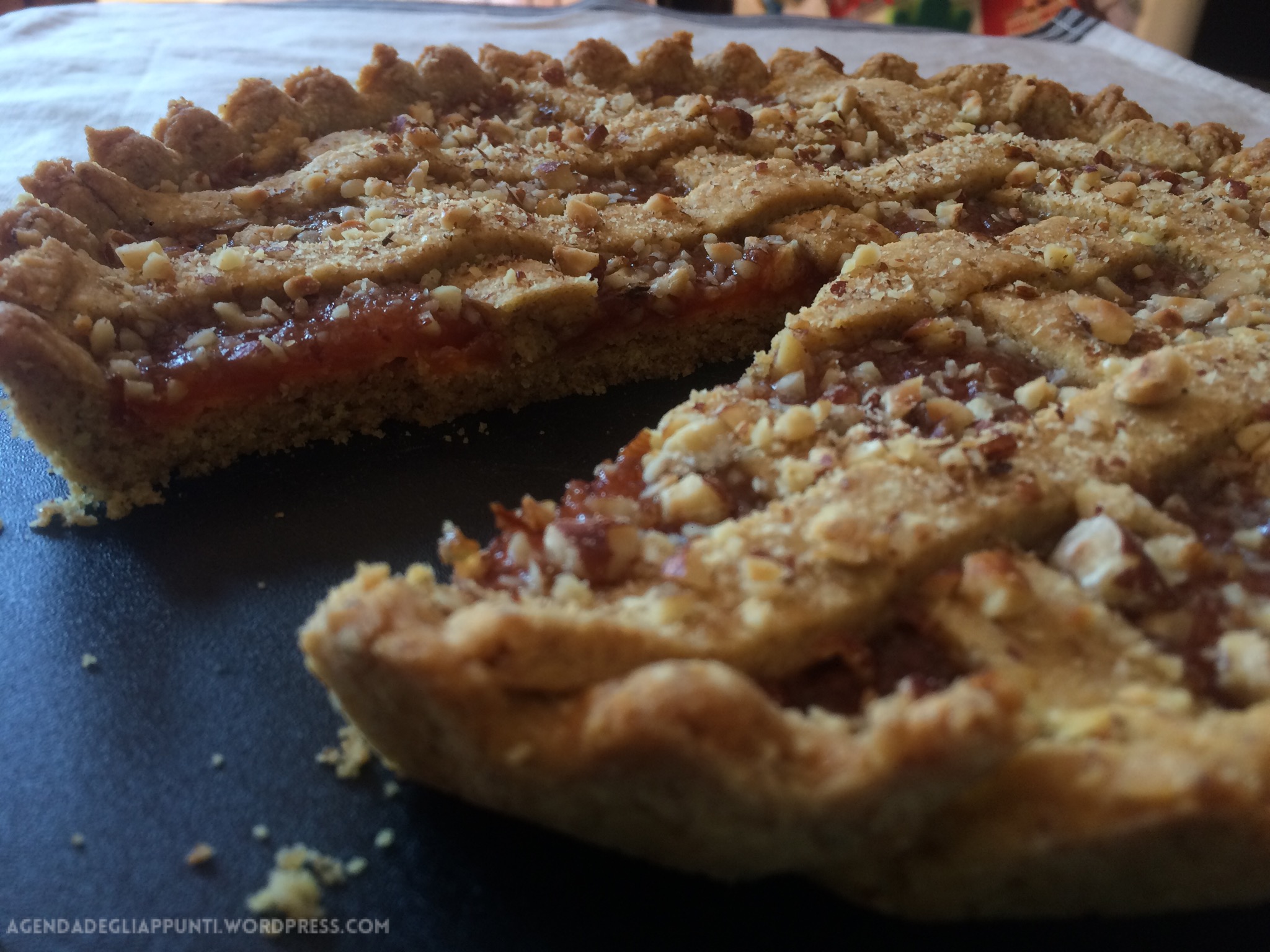 pasta frolla crostata marmellata pesche bio granella nocciole bio