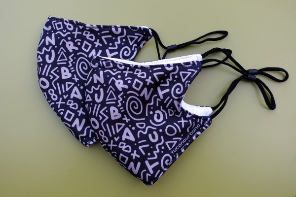 due mascherine filtranti in cotone con cordini elastici